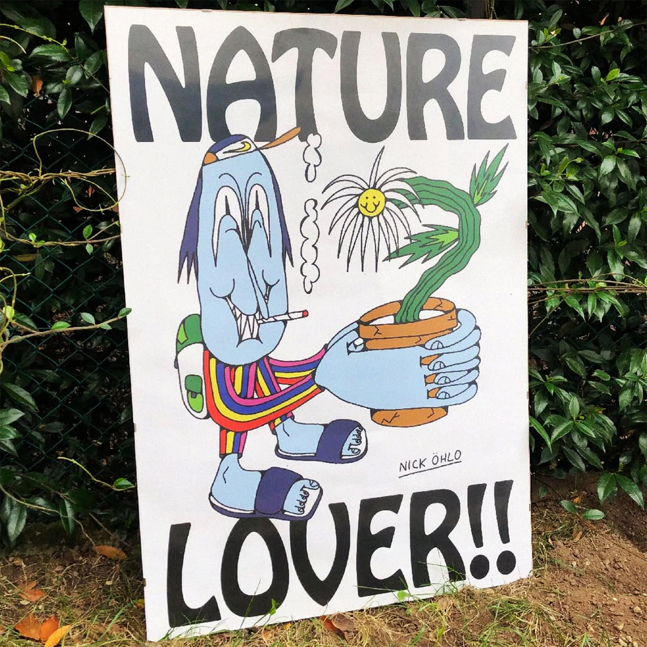 A large print with a happy character holding a plant and smoking, with the text "Nature lover" set against a green bush.